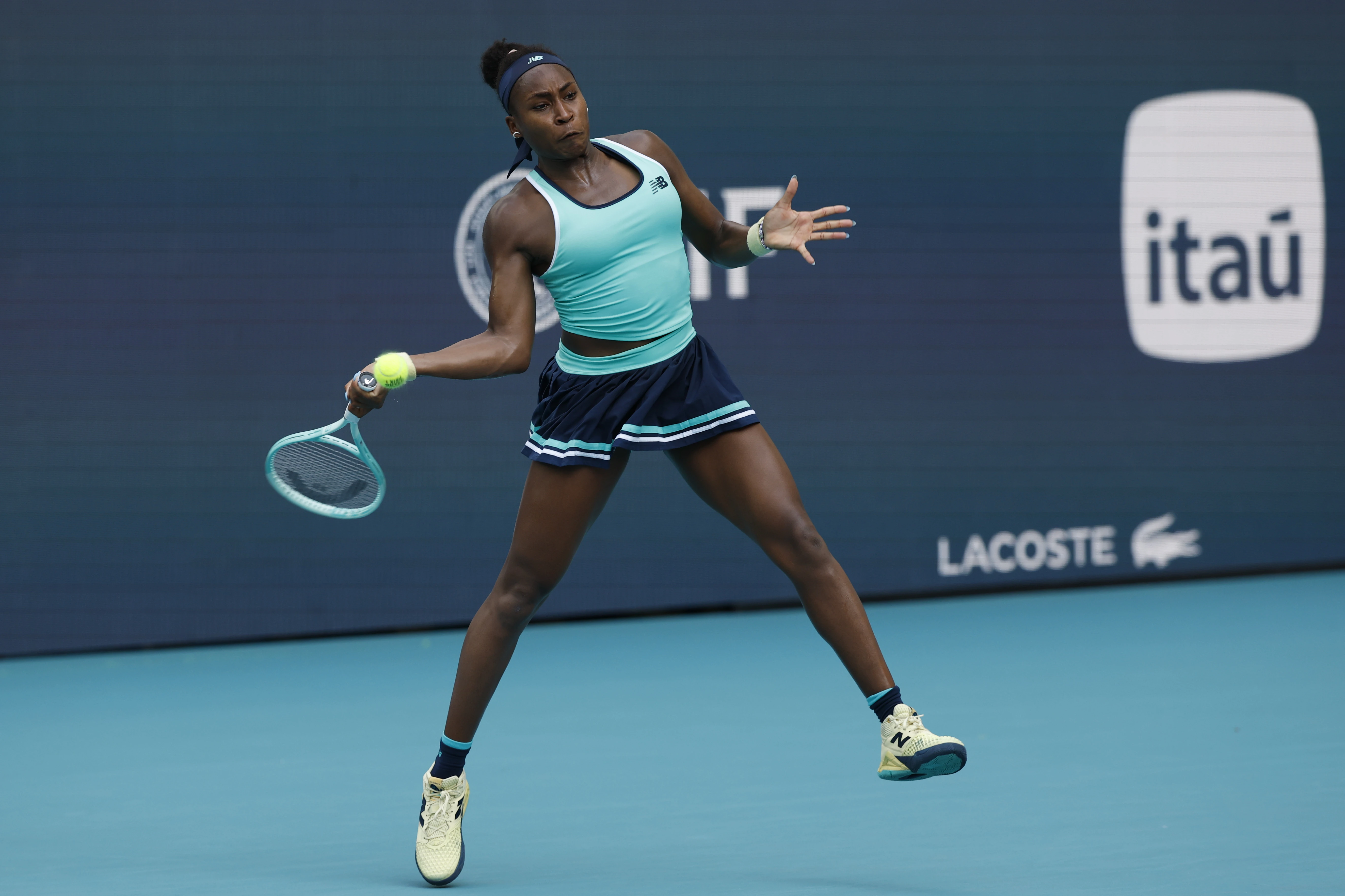Mar 24, 2025; Miami, FL, USA; Coco Gauff (USA) hits a forehand against Magna Linette (POL)(not pictured) on day seven of the Miami Open at Hard Rock Stadium.